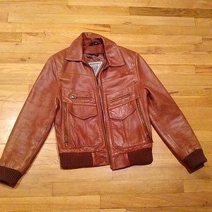 Brown leather motorcycle jacket, size xs